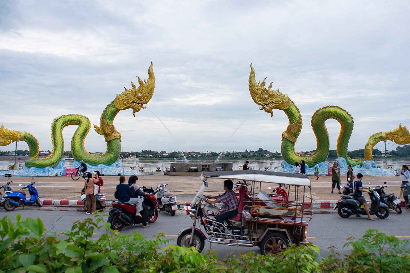 Twin Naga statues on the Mekong riverside promenade in Nong Khai