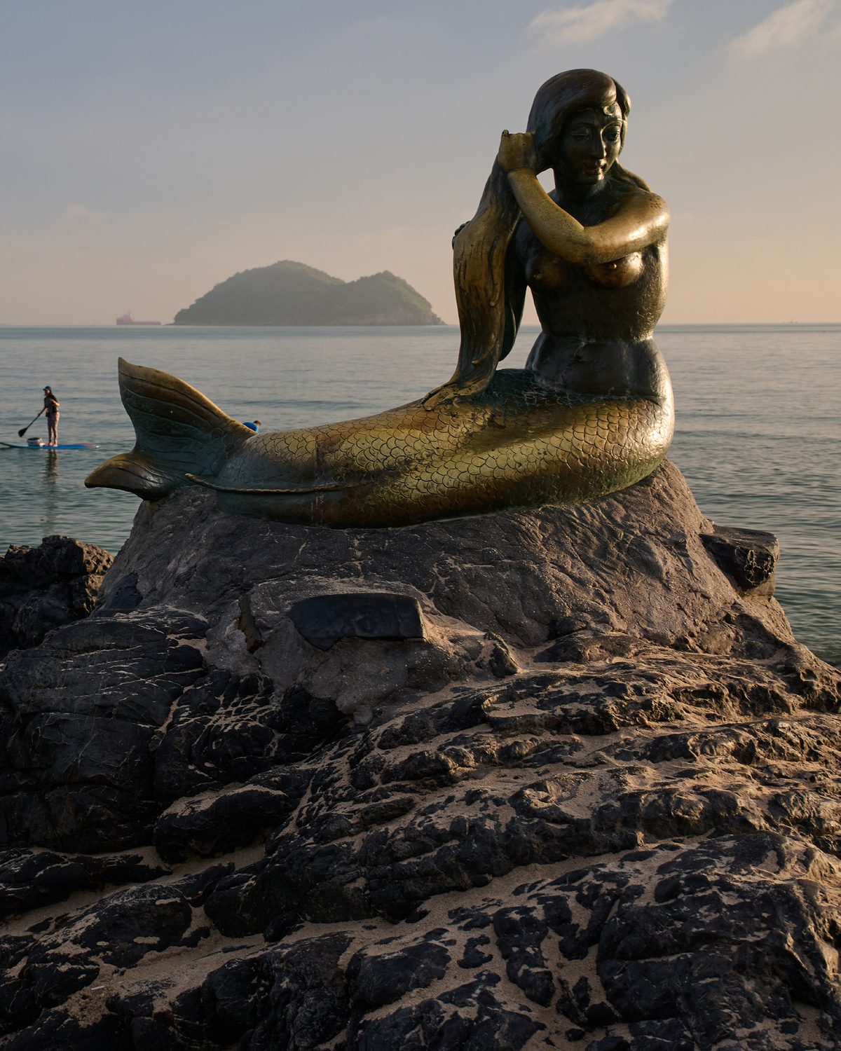 Golden Mermaid statue on a rock at Samila Beach, Songkhla